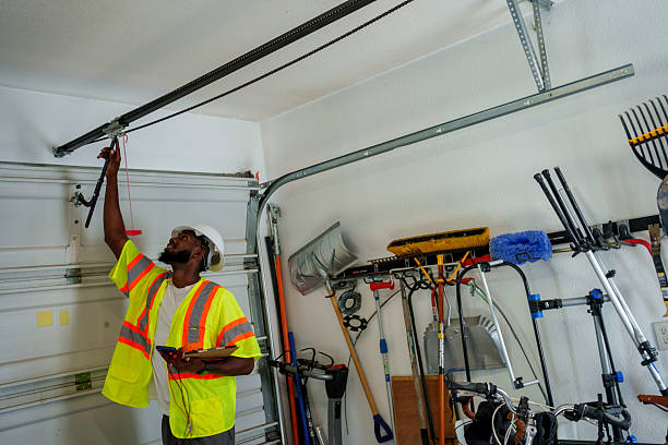 Professional Garage Door Roller Replacement technician working in Delaware City, DE